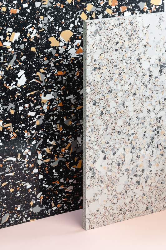 Close-up of a black, white and gray decorative flake floor finish
